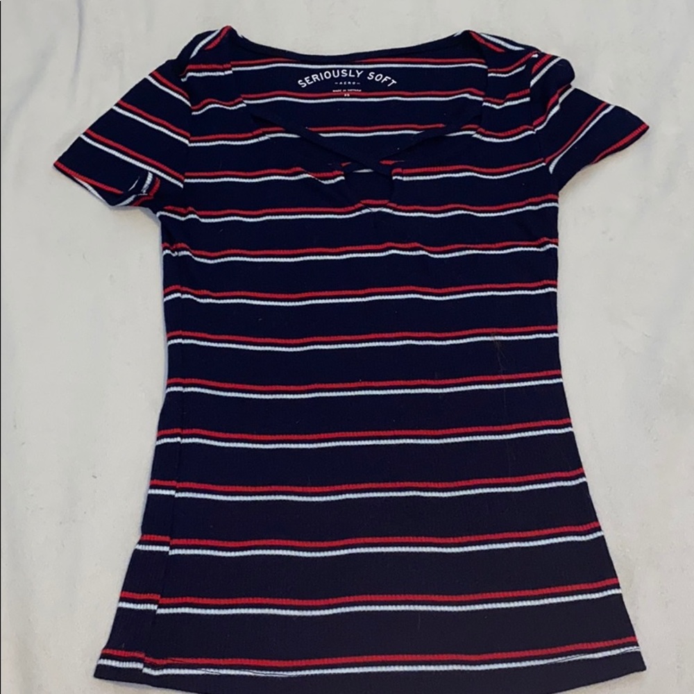 Low cut tight blouse.